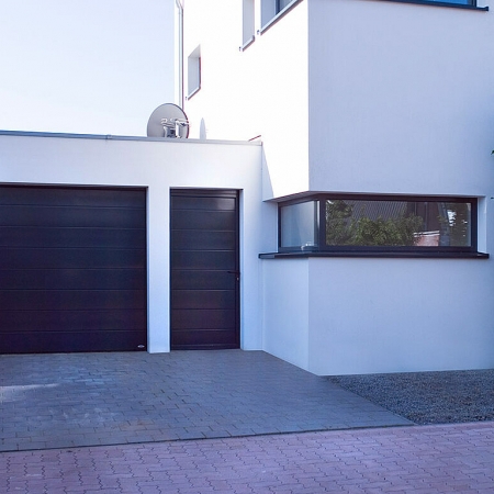 Matching side doors for sectional garage doors